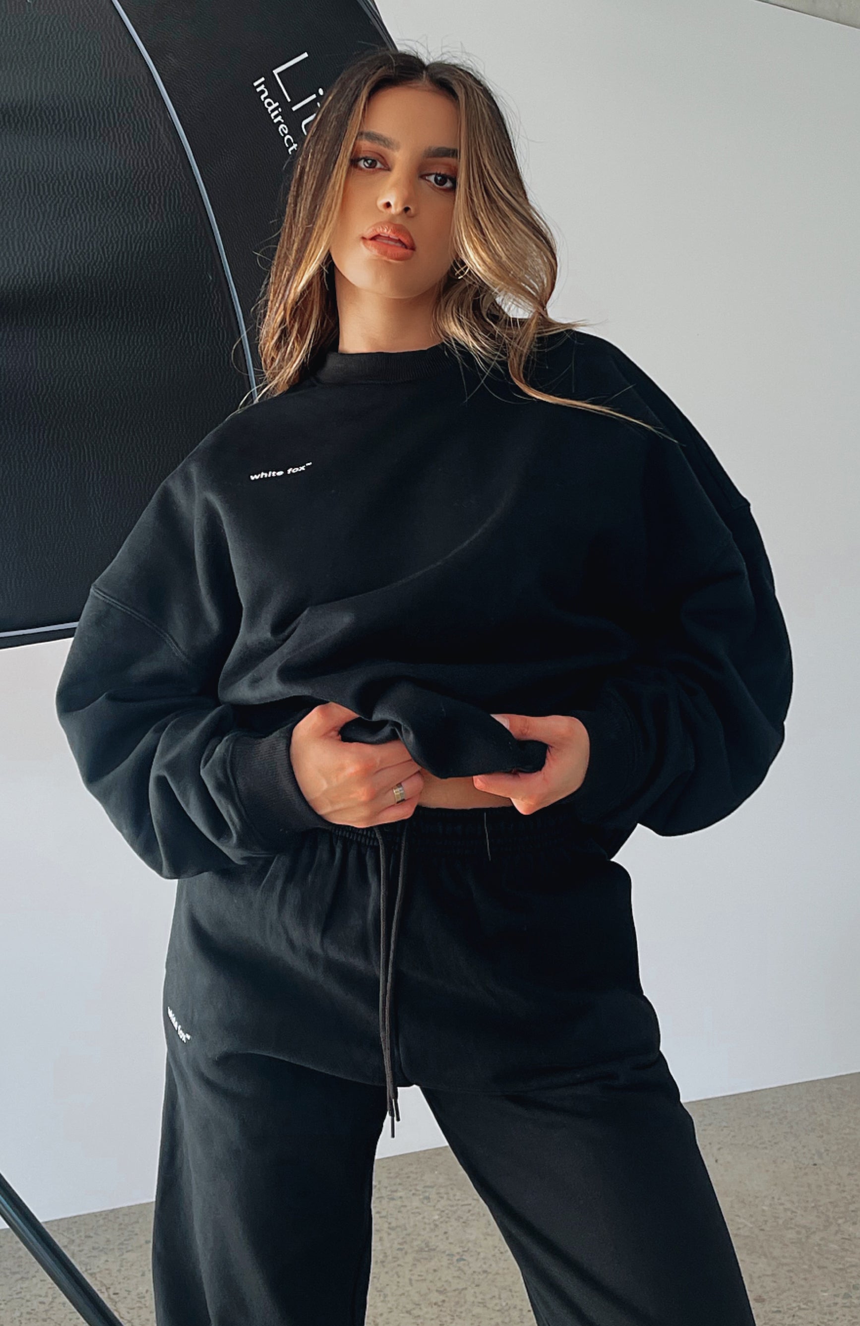 Black Own The Moment Unisex Sweater - Ribbed Neckline & Soft Loopback